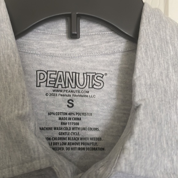 Peanuts ~ Charlie, Lucy, Snoopy, and Woodstock playing golf print polo shirt - Picture 3 of 4